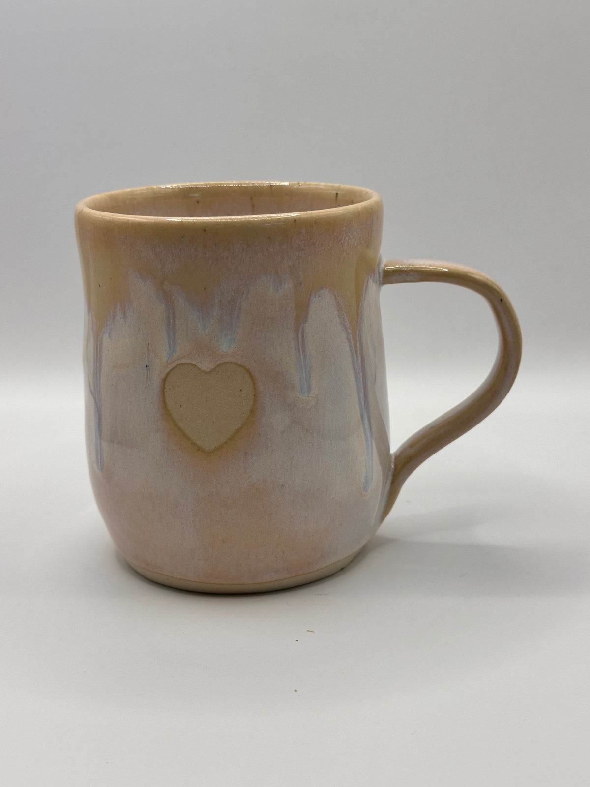 Mudhut Potters Wellington - Curvy cup with handle - Pink and Purple hues with heart - 340 ml