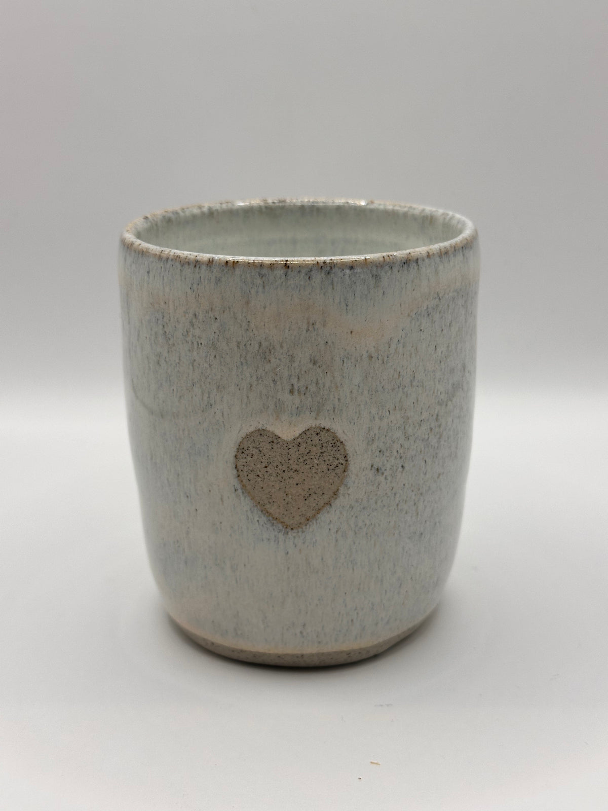 Mudhut Potters Wellington - Tumbler - White flux, grey speckle clay with a heart - 280 ml