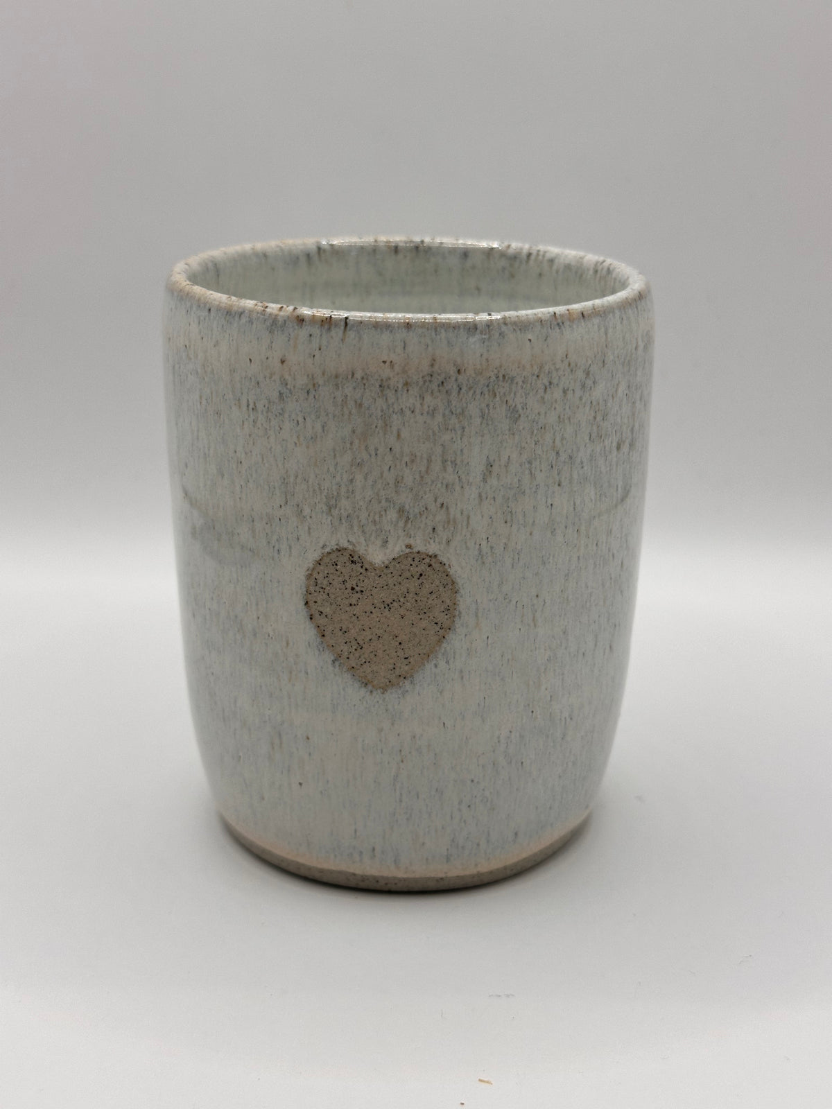 Mudhut Potters Wellington - Tumbler - White flux, grey speckle clay with a heart - 320 ml